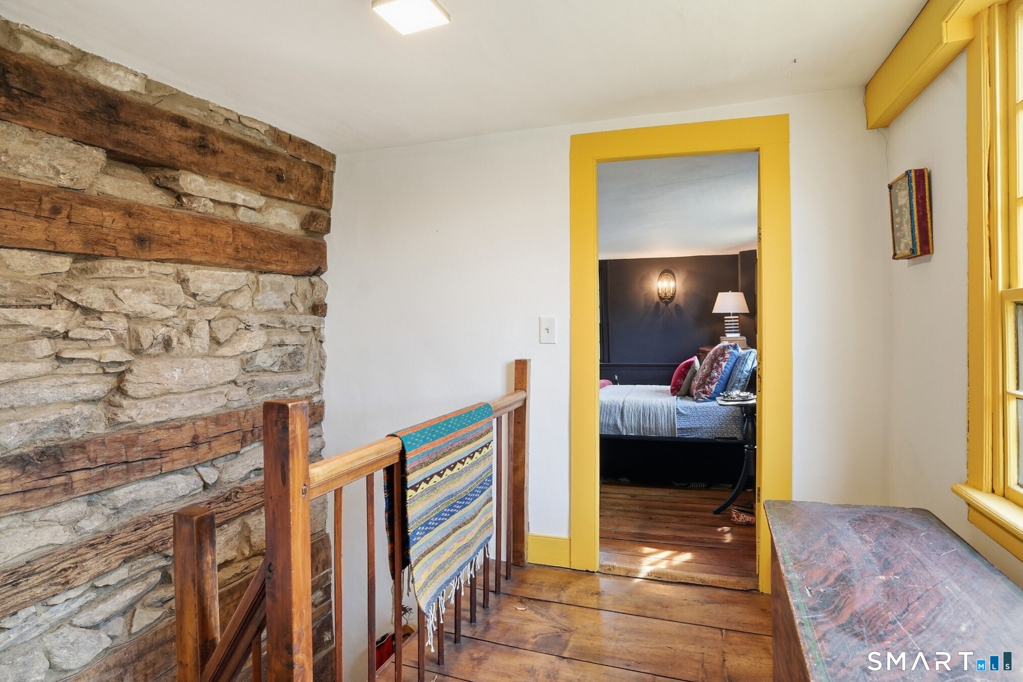 604 Pendleton Hill Road North Stonington, CT 06359 - Photo 22 of 39 a bedroom with a bed and a window