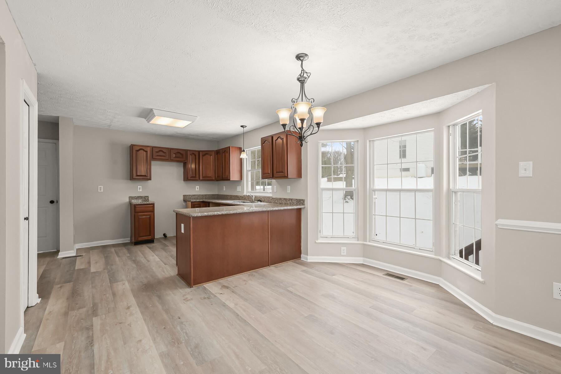 6814 King Road Boonsboro, MD 21713 - Photo 12 of 40 Breakfast Room w/ new LVP & Bay Window