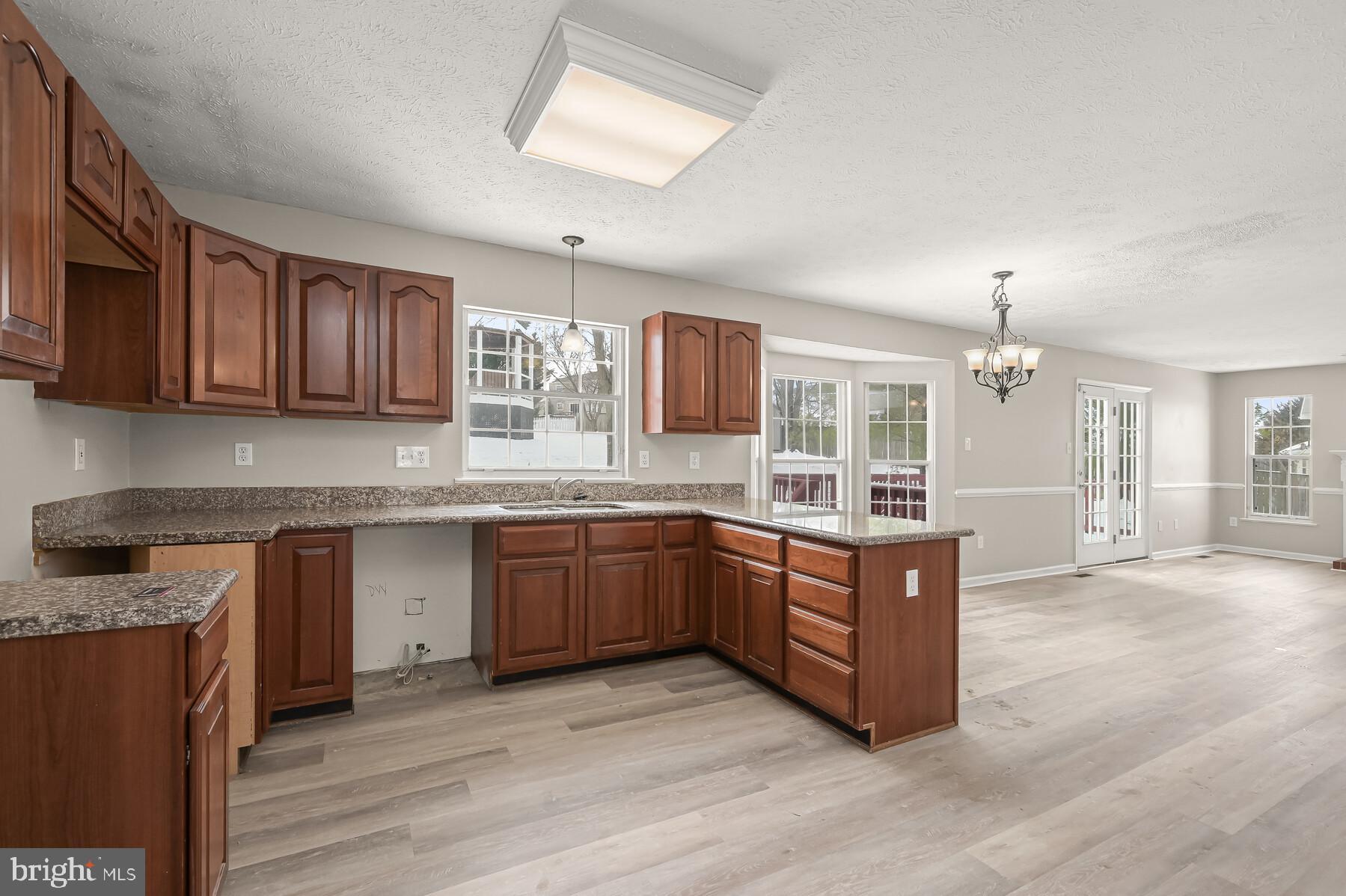 6814 King Road Boonsboro, MD 21713 - Photo 10 of 40 Kitchen w/ granite counters & new LVP floors
