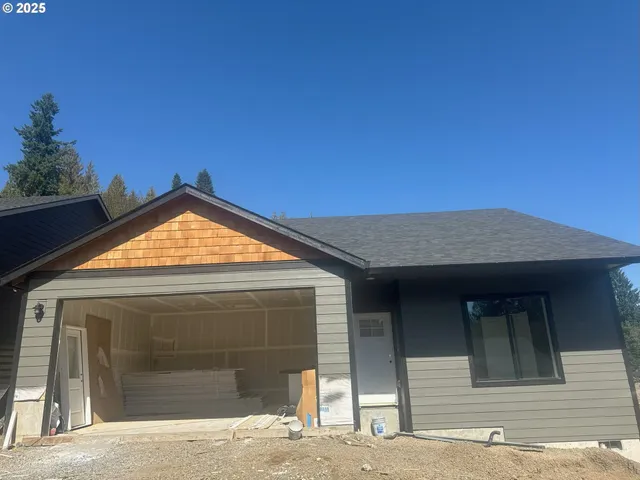 a view of a house with a garage