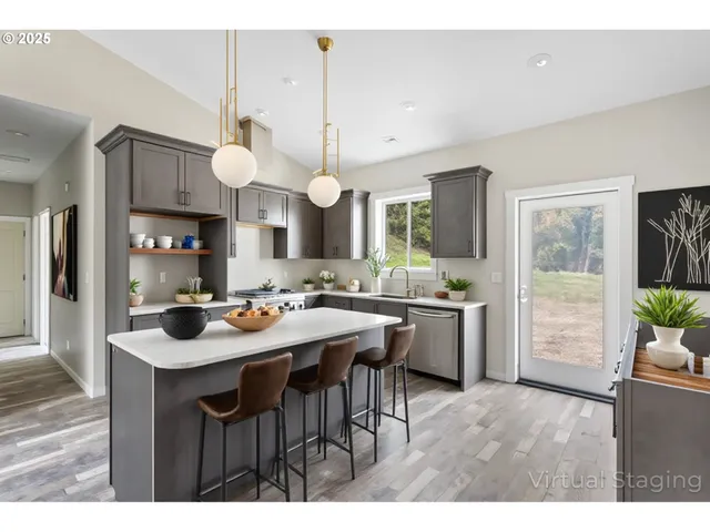 a kitchen with a table and chairs in it