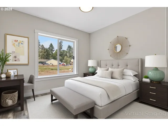 a bedroom with double bed and a window