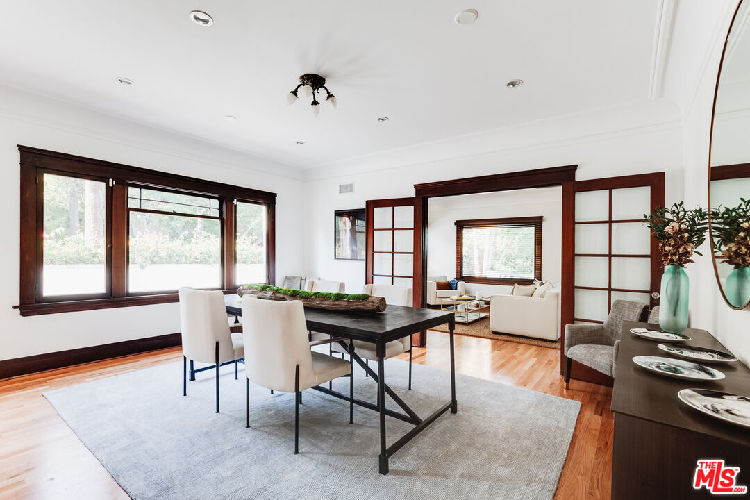 5850 Foothill Drive Los Angeles, CA 90068 - Photo 15 of 33 a living room with furniture and a floor to ceiling window
