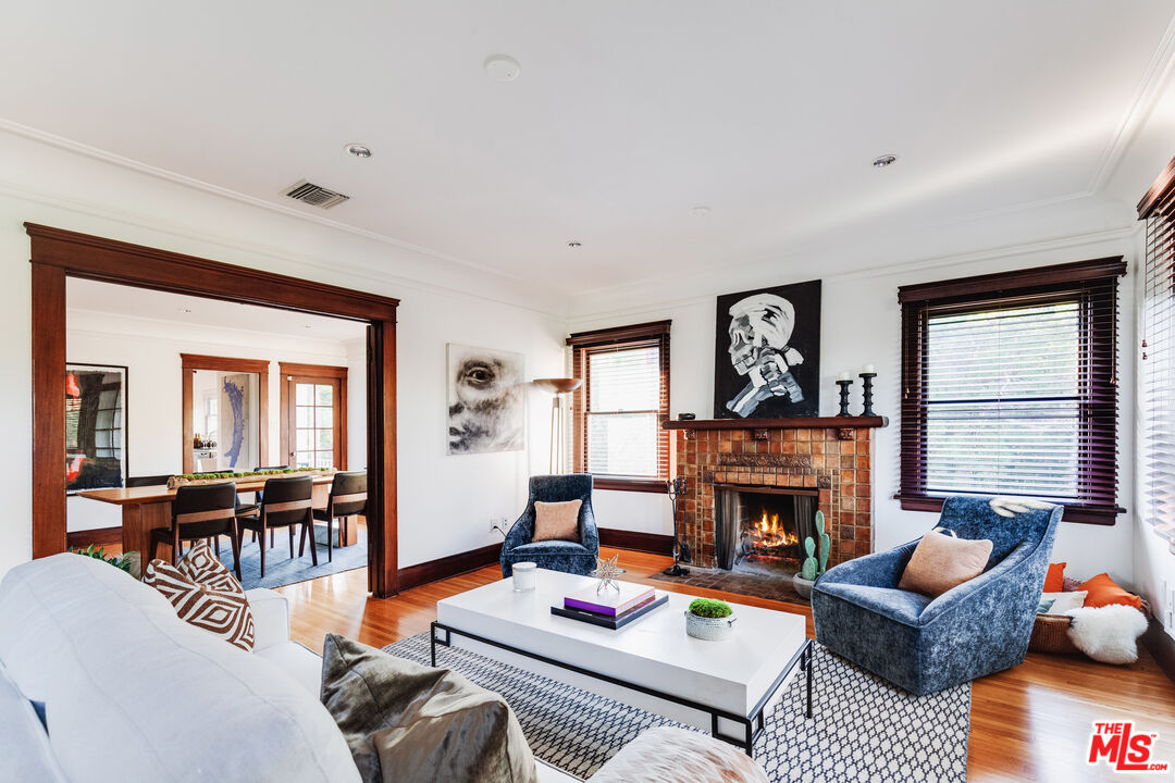 5850 Foothill Drive Los Angeles, CA 90068 - Photo 19 of 33 a living room with furniture fireplace and a window
