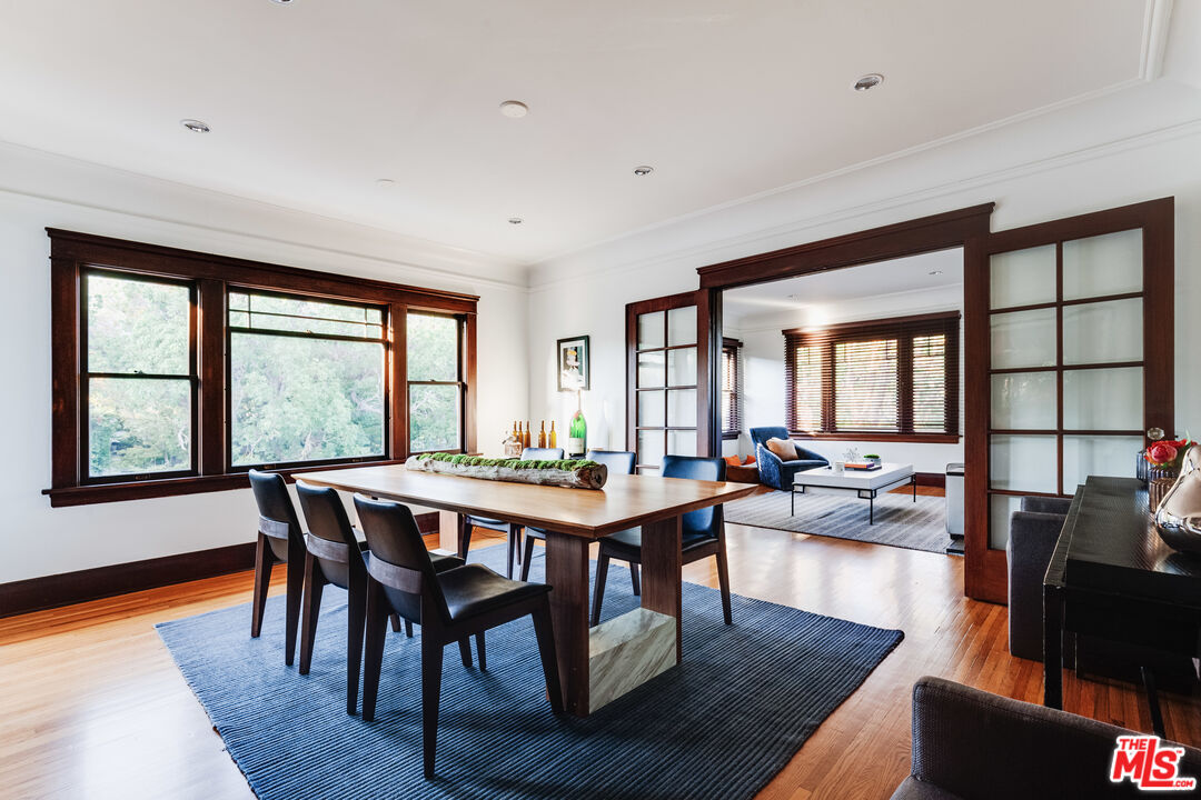 5850 Foothill Drive Los Angeles, CA 90068 - Photo 20 of 33 a view of a dining room with furniture window and wooden floor
