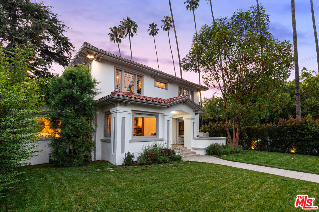 5850 Foothill Drive Los Angeles, CA 90068 - Photo 3 of 33 a front view of a house with a yard