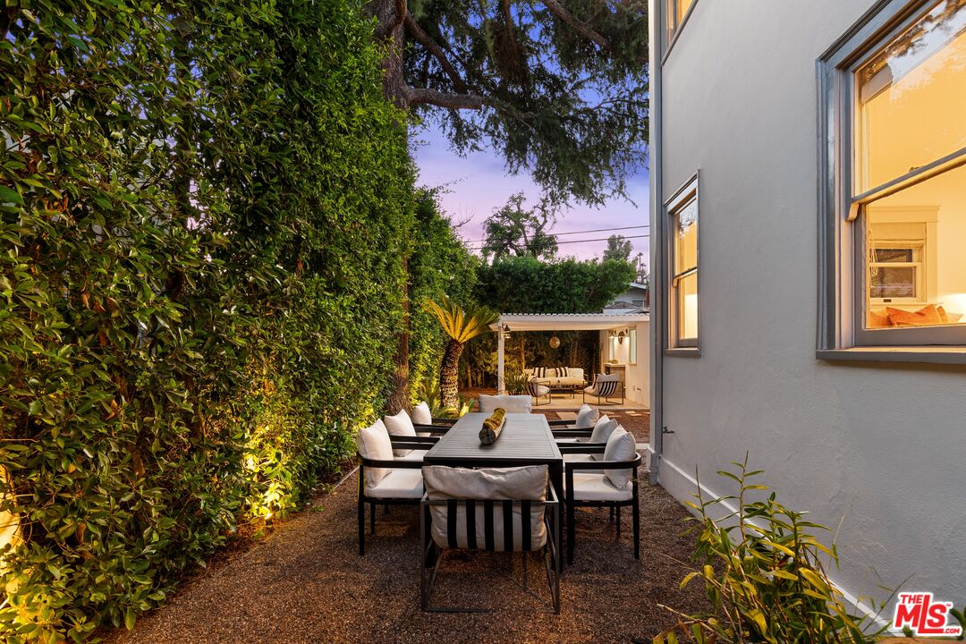 5850 Foothill Drive Los Angeles, CA 90068 - Photo 28 of 33 a view of a house with backyard sitting area and garden