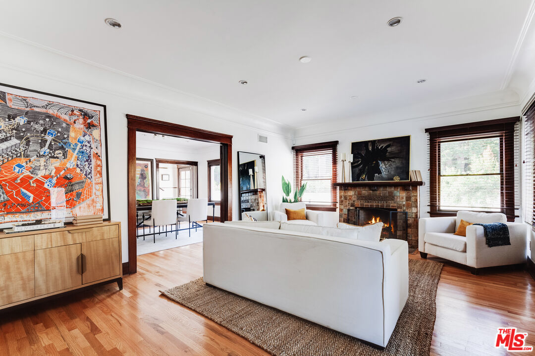 5850 Foothill Drive Los Angeles, CA 90068 - Photo 4 of 33 a living room with furniture and a flat screen tv