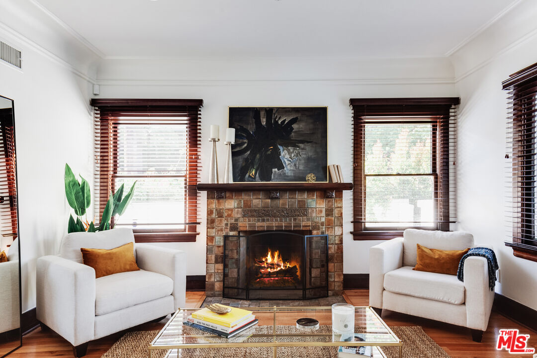 5850 Foothill Drive Los Angeles, CA 90068 - Photo 5 of 33 a living room with furniture and a fireplace