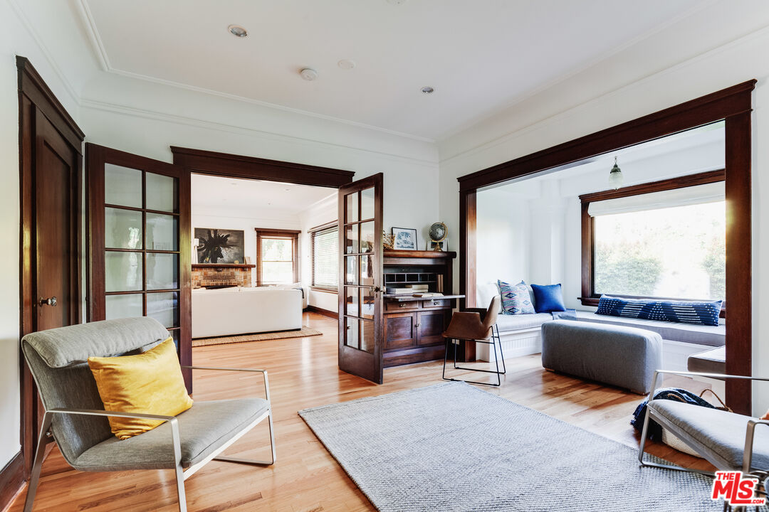 5850 Foothill Drive Los Angeles, CA 90068 - Photo 7 of 33 a living room with furniture and a flat screen tv