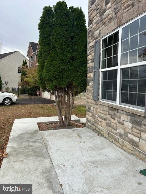 16272 Eagle Flight Circle Woodbridge, VA 22191 - Photo 2 of 19 a front view of a house with a yard