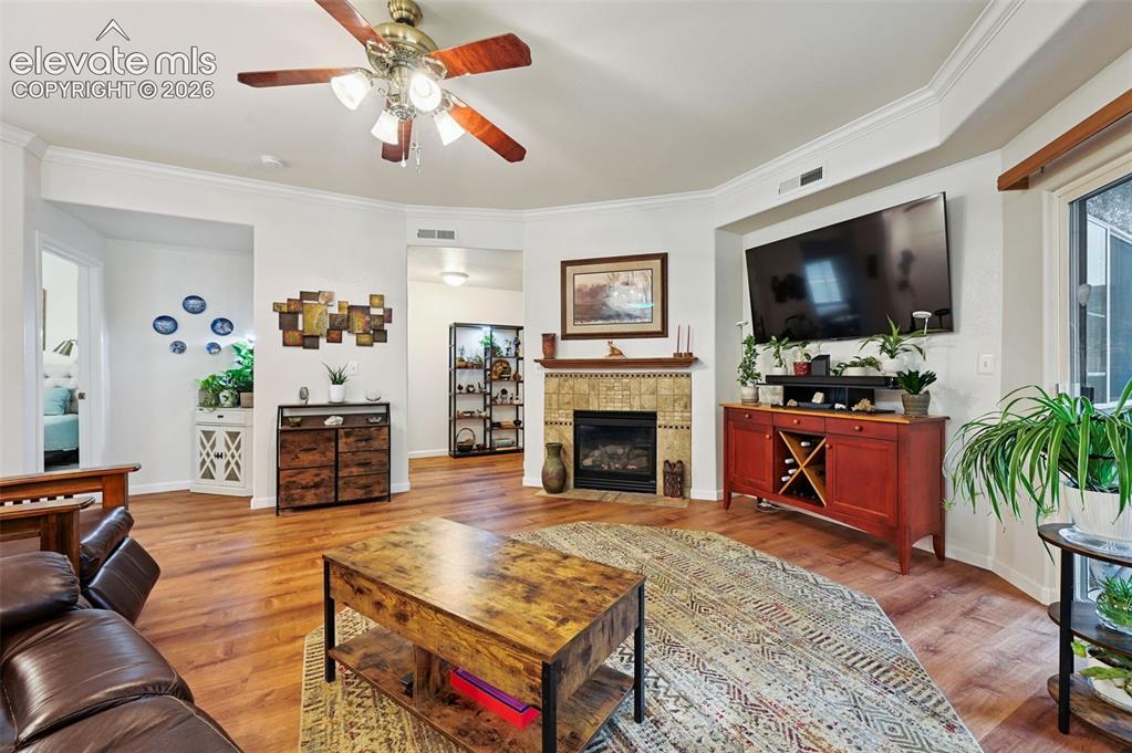 4007 Riviera Grove, Unit 103 Colorado Springs, CO 80922 - Photo 4 of 22 Stay cozy with this gas fireplace