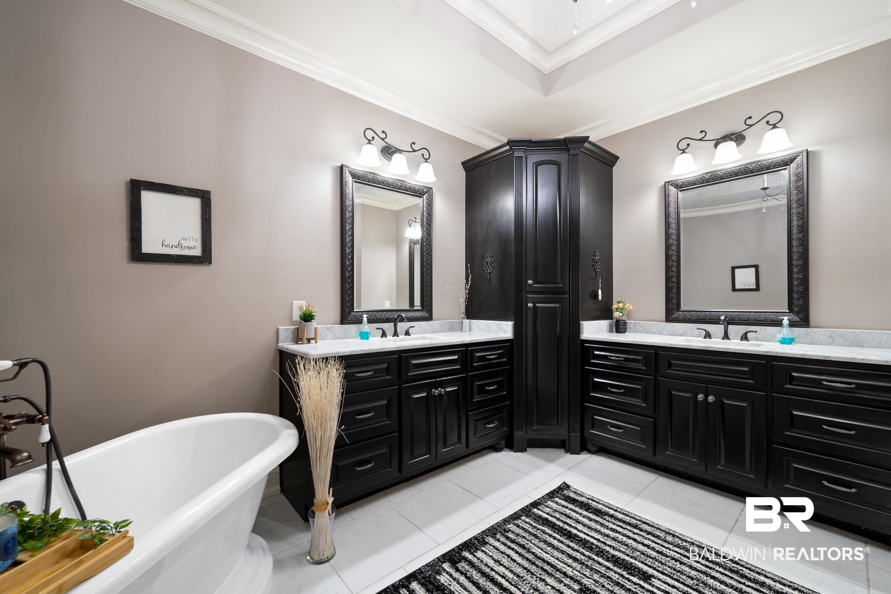 31829 Butler Drive Daphne, AL 36527 - Photo 26 of 48 Bathroom featuring crown molding, tile patterned flooring, vanity, and a washtub