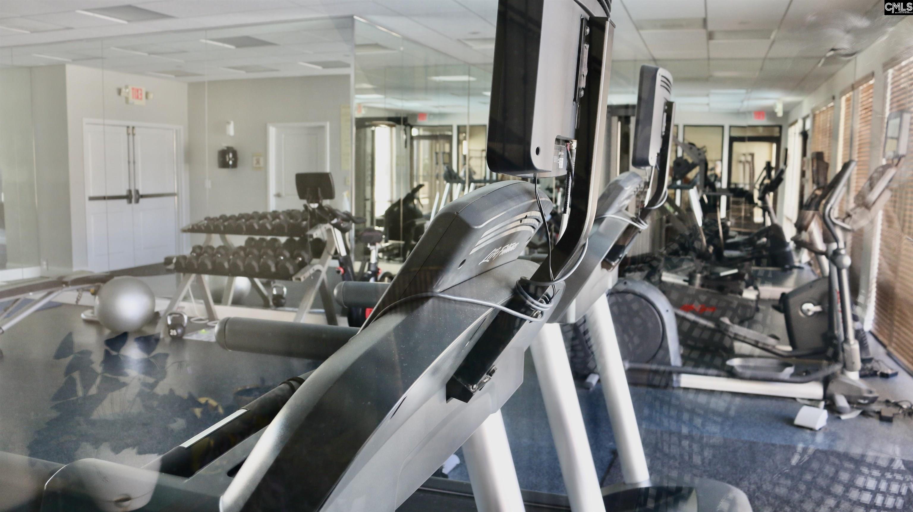 601 Main Street, Unit 323 Columbia, SC 29201 - Photo 54 of 68 a view of a living room with gym equipment