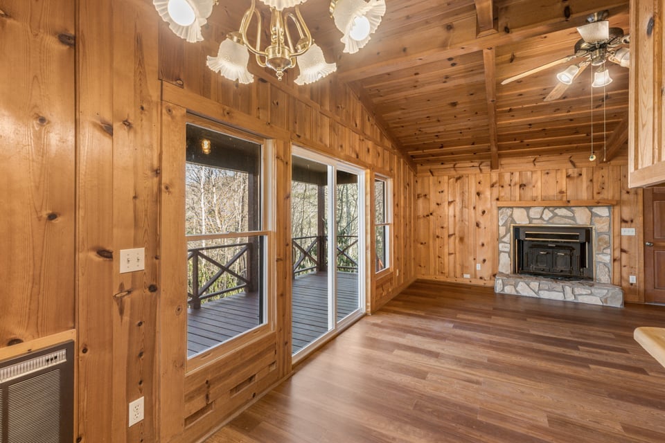 795 Buck Falls Road Highlands, NC 28741 - Photo 13 of 39 Living area with sliding glass doors leading to the covered deck
