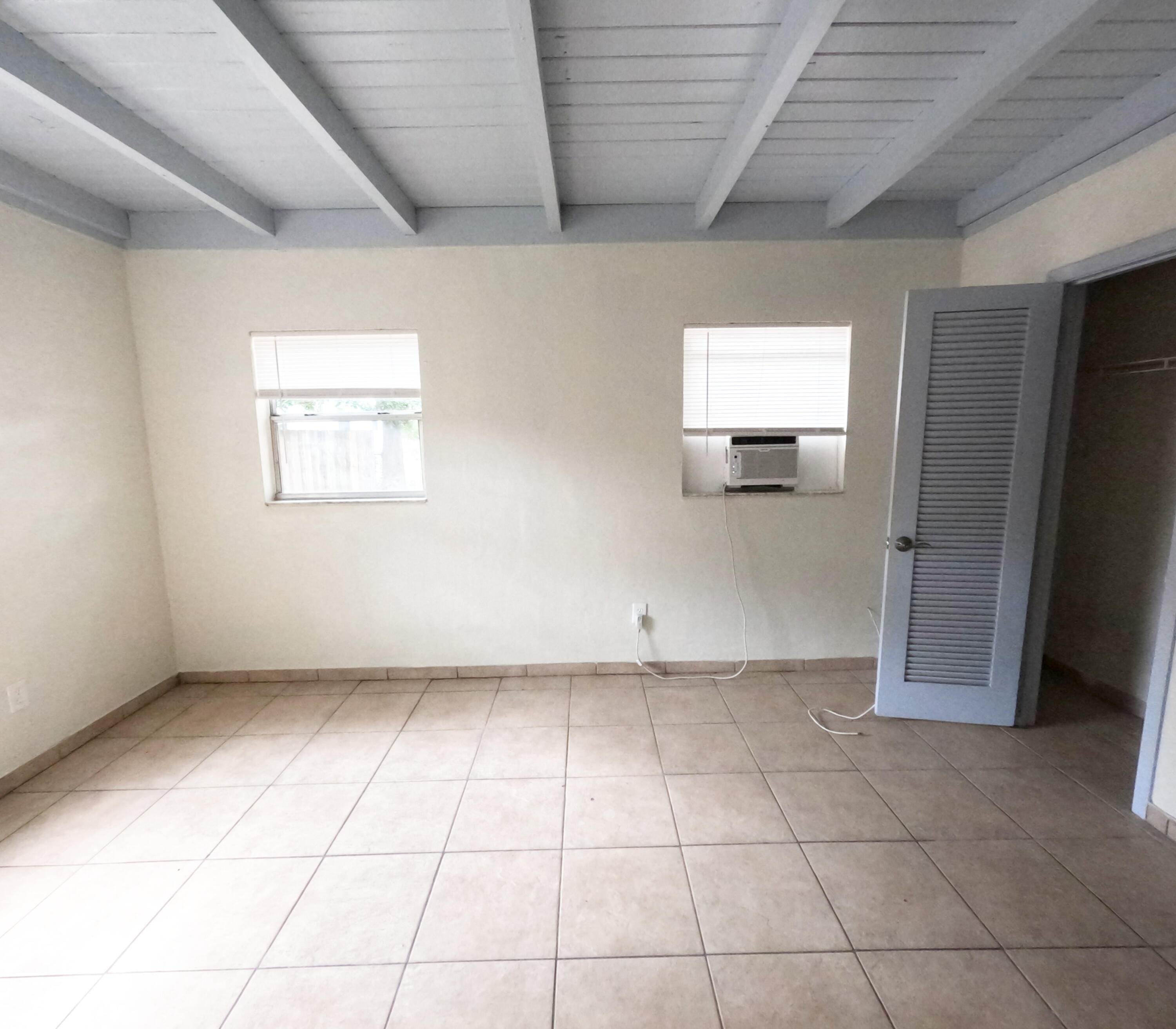 403 South 14th Street Fort Pierce, FL 34950 - Photo 12 of 19 a view of an empty room with a window
