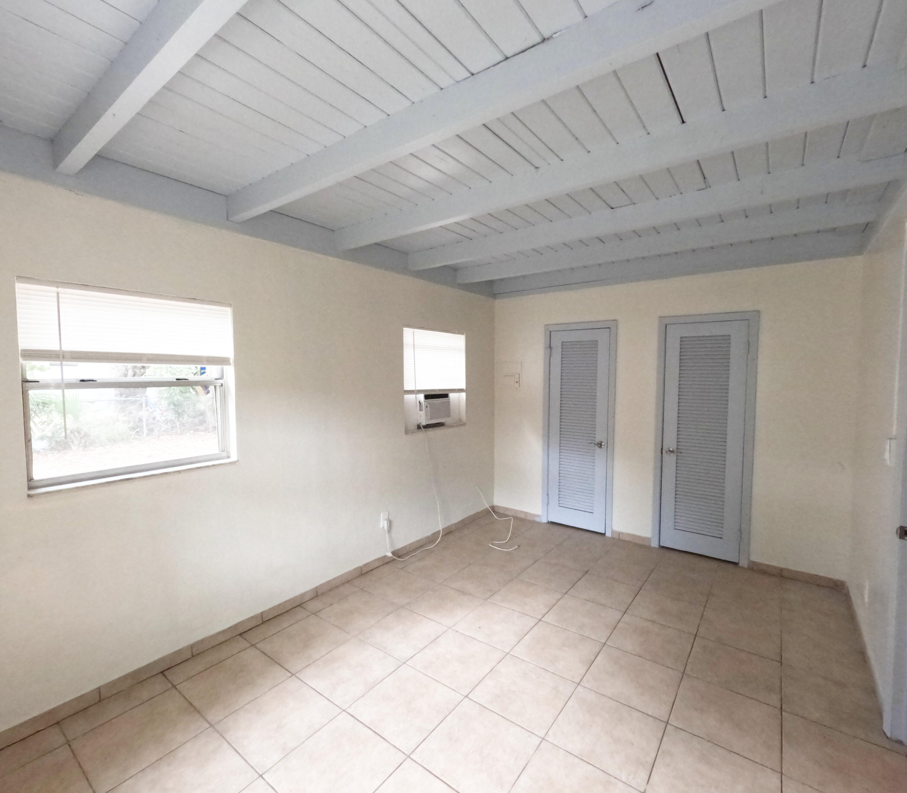 403 South 14th Street Fort Pierce, FL 34950 - Photo 14 of 19 an empty room with windows