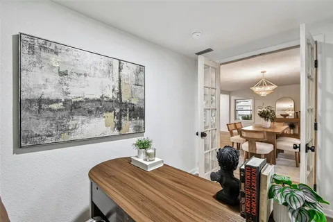 a bedroom with furniture and a window