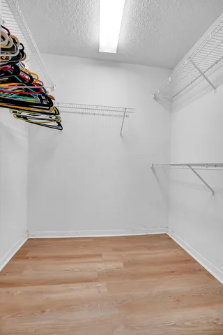 a view of a room with racks on the wall