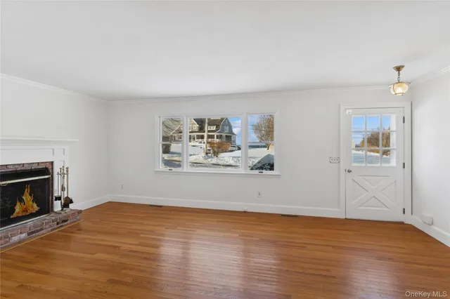 a view of a door and a window