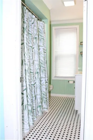 a bathroom with a bathtub and shower