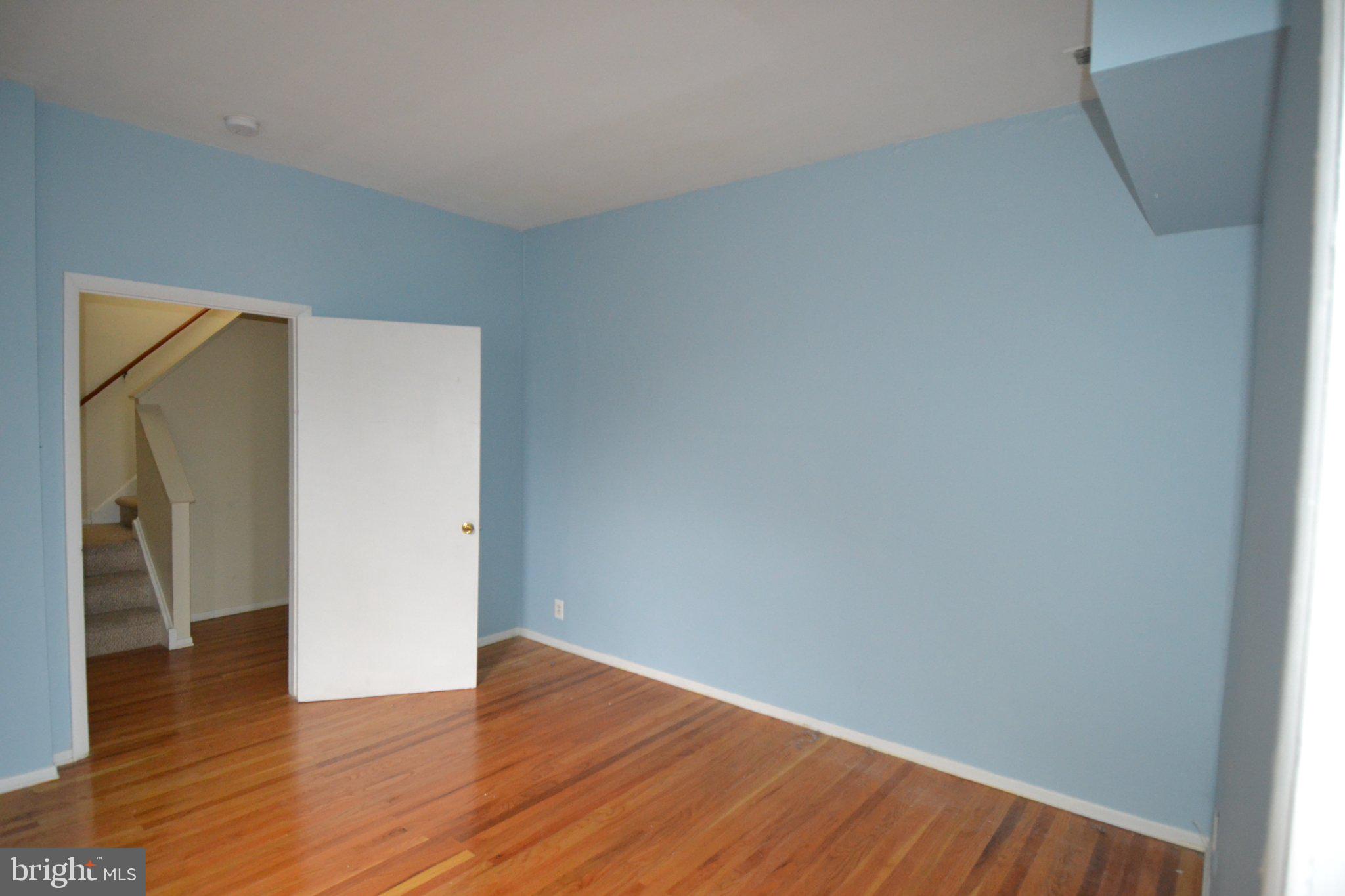 1010 Clinton Street, Unit 3M Philadelphia, PA 19107 - Photo 12 of 15 Bright, airy space with wooden floors.
