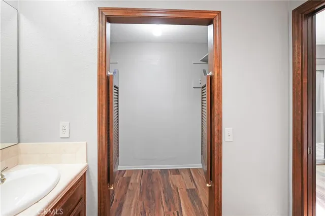 a bathroom with a tub and sink