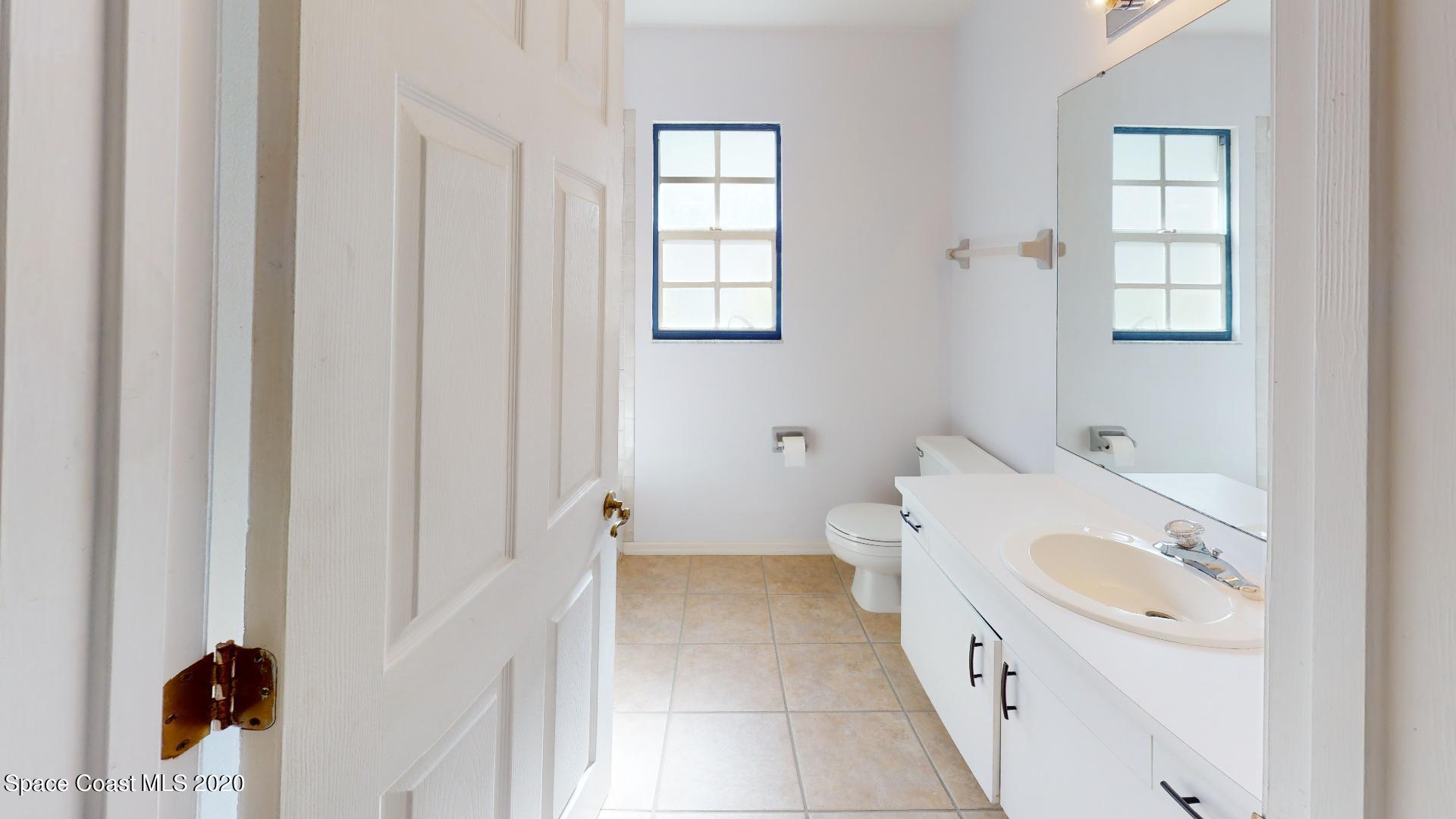 322 Myrtlewood Road Melbourne, FL 32940 - Photo 29 of 40 322-Myrtlewood-Rd-Bathroom(1)