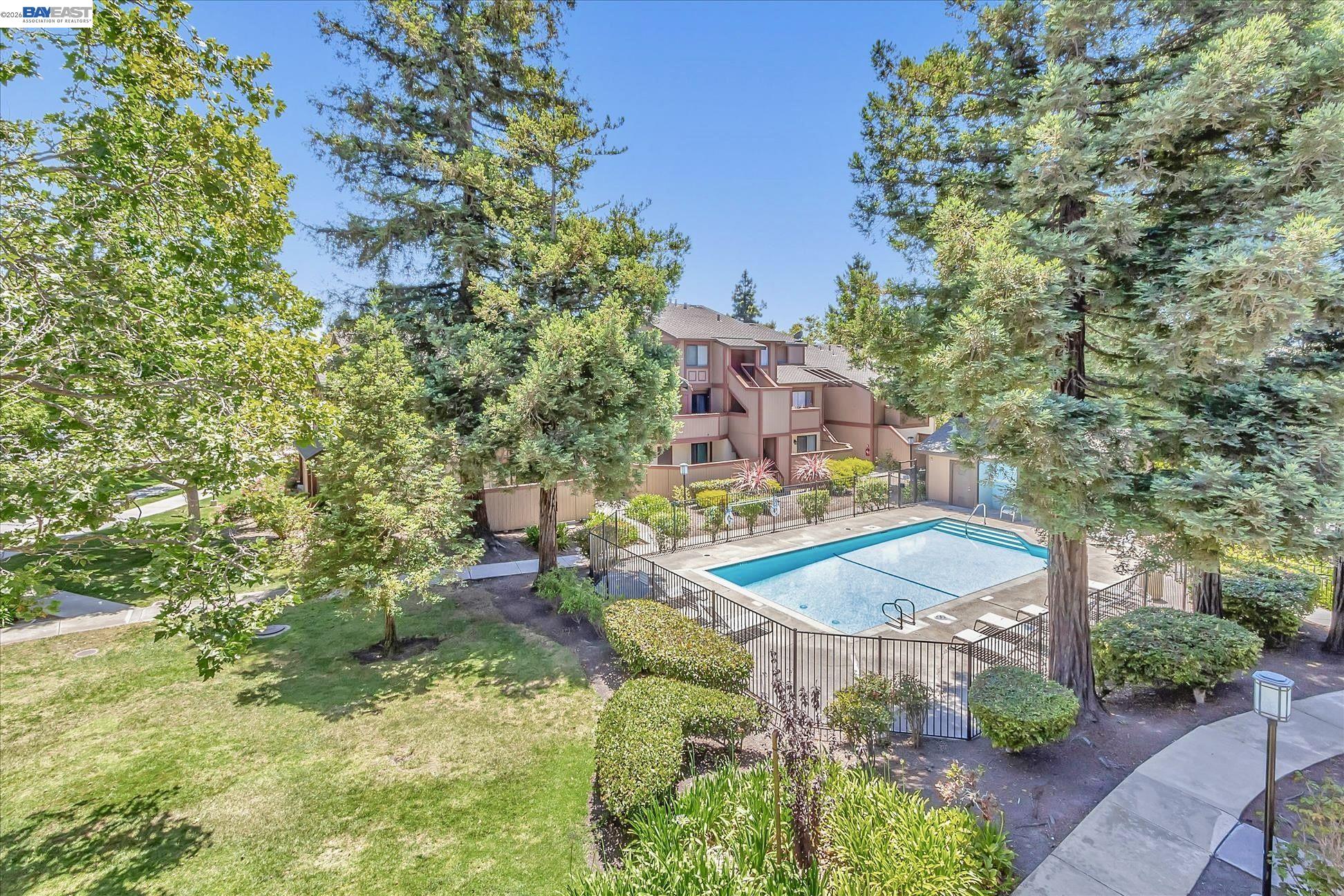 304 Hackamore Lane Fremont, CA 94539 - Photo 23 of 45 an aerial view of a house with a yard and trees