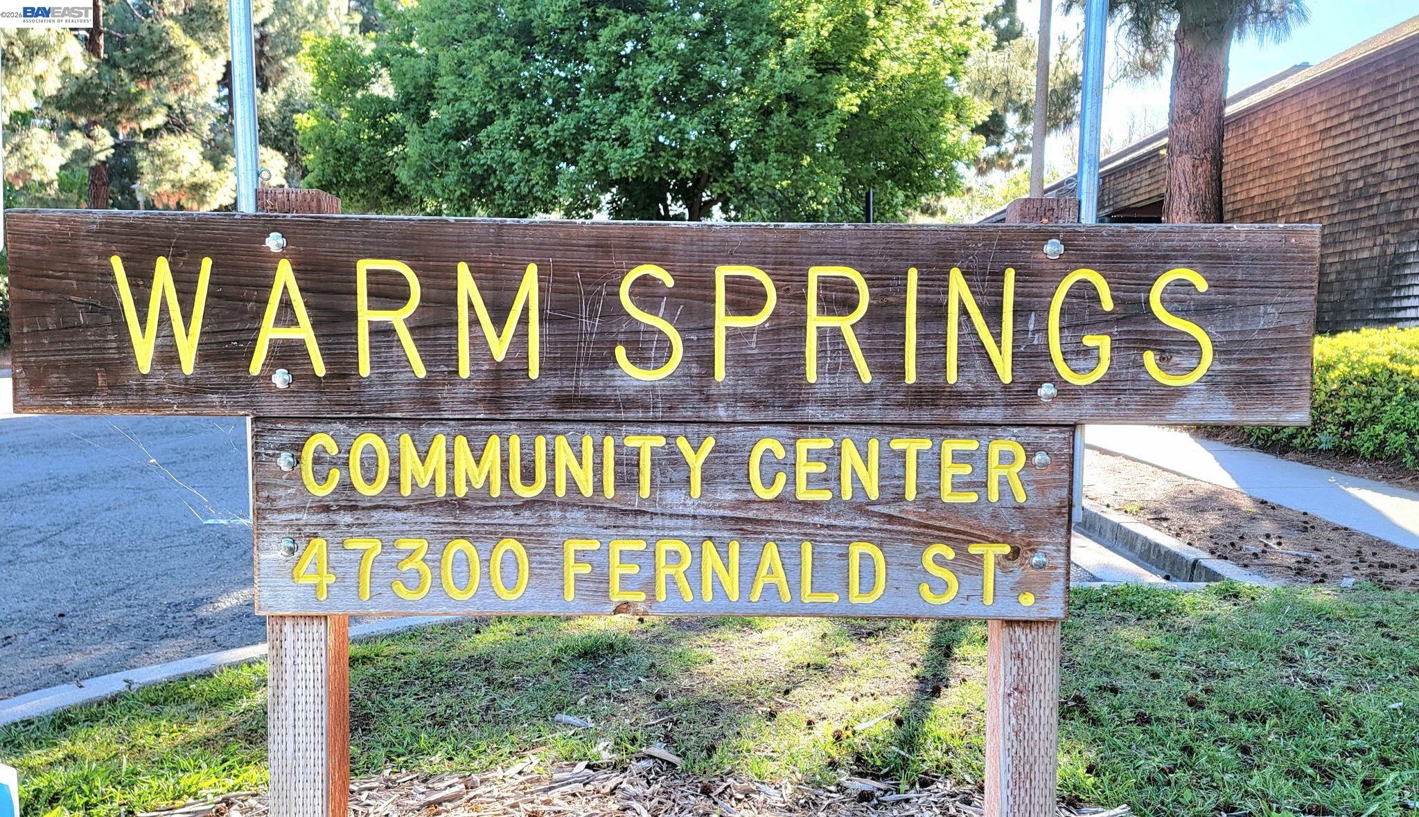304 Hackamore Lane Fremont, CA 94539 - Photo 36 of 45 a street sign that is on the side of a building