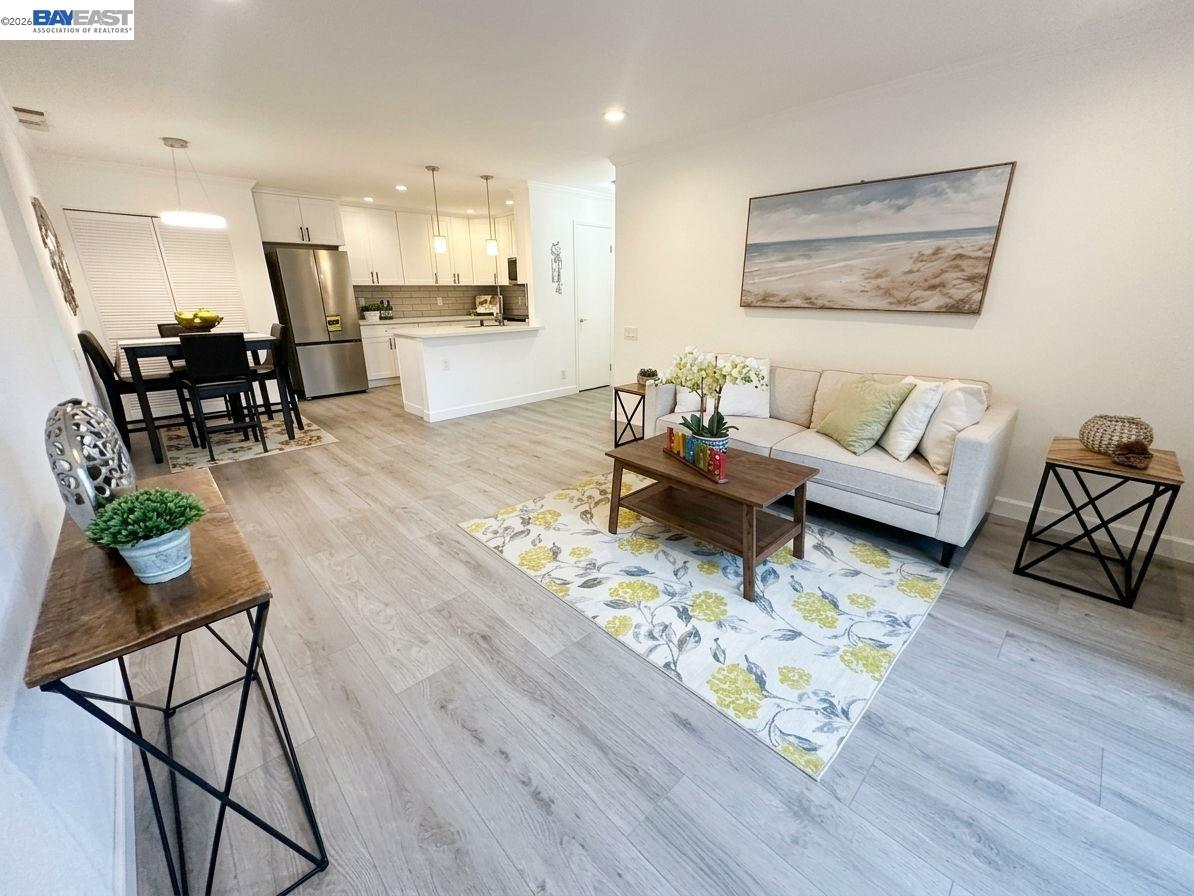 304 Hackamore Lane Fremont, CA 94539 - Photo 6 of 45 a living room with furniture and wooden floor