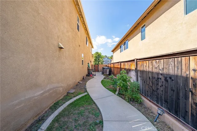 a view of a backyard with a garden