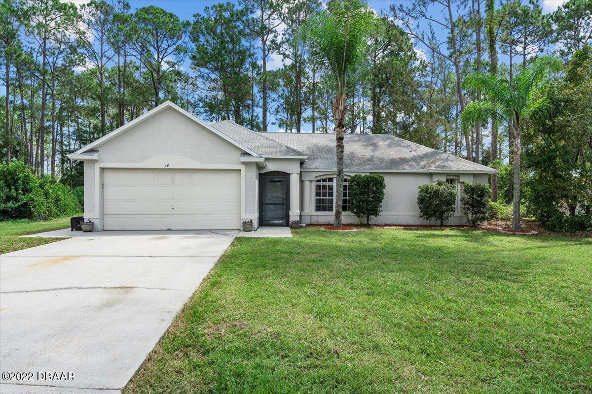 18 Rippling Place Palm Coast, FL 32164 - Photo 1 of 30 Front