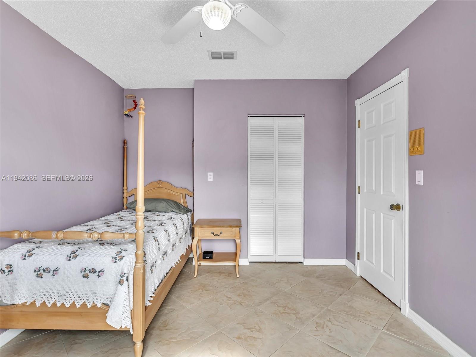 14824 Southwest 112th Street Miami, FL 33196 - Photo 36 of 56 Bedroom #4 looks onto the pool and the lake