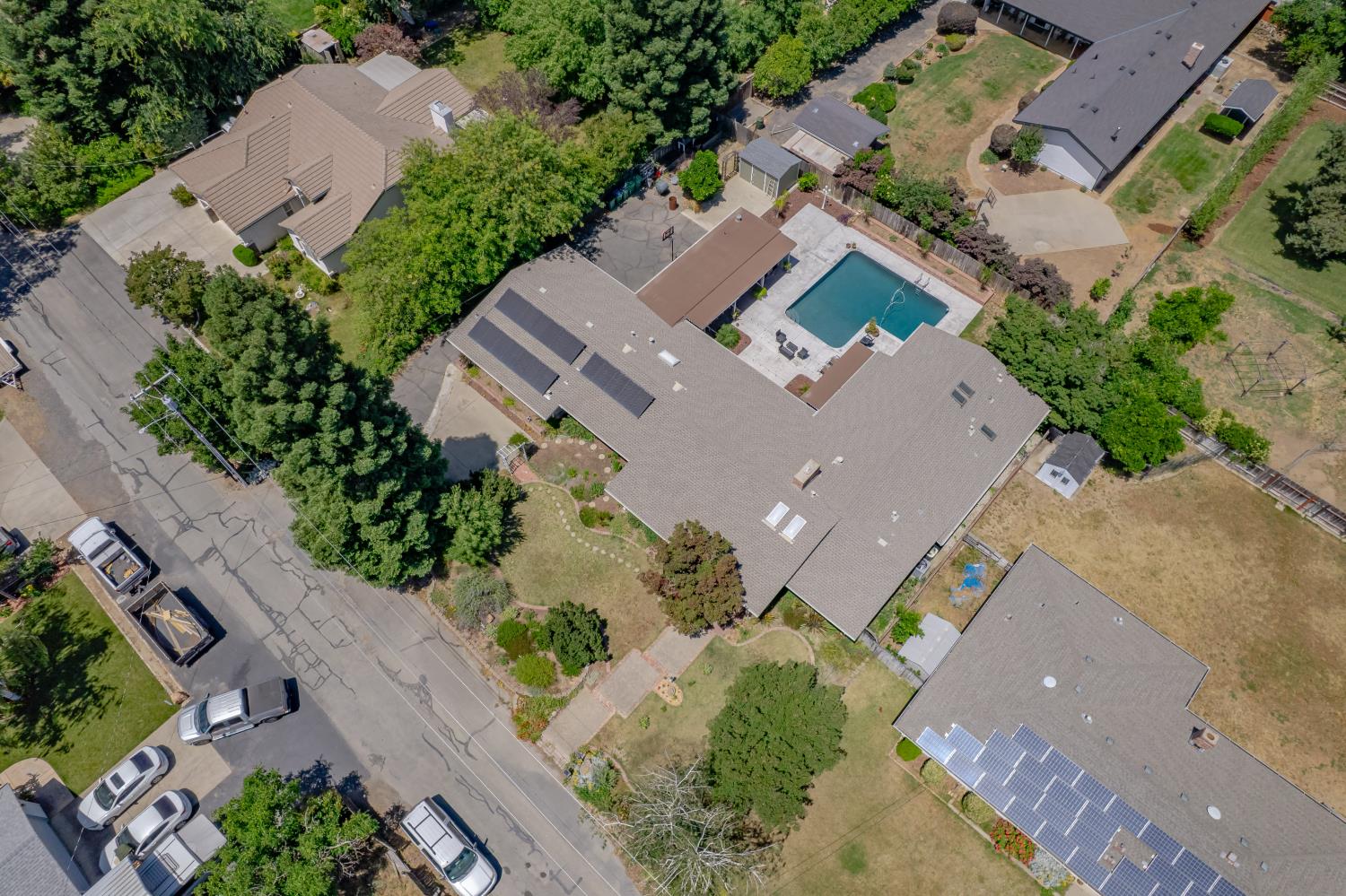 1880 Magnolia Street Gridley, CA 95948 - Photo 76 of 95 an aerial view of a house with a yard and a lot of flower plants