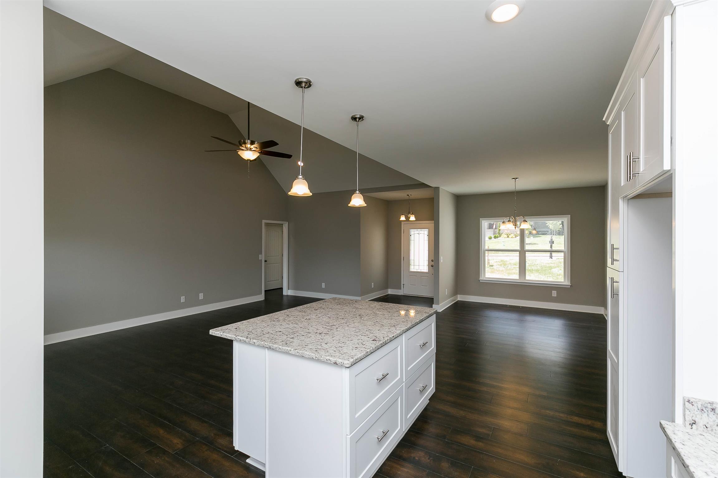 186 Fieldstone Lane Springfield, TN 37172 - Photo 11 of 22 a view of a hallway with wooden floor and staircase