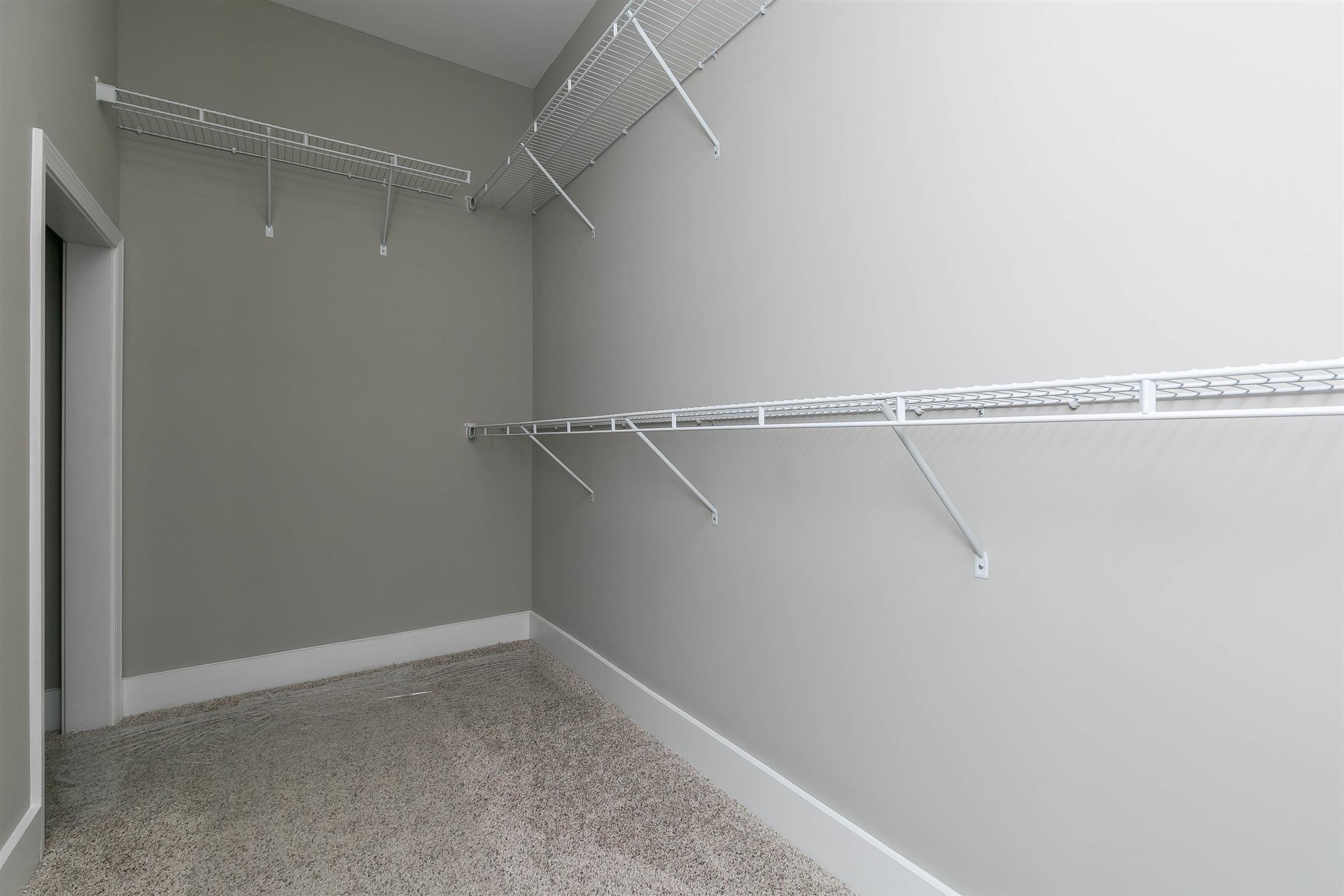 186 Fieldstone Lane Springfield, TN 37172 - Photo 17 of 22 a view of a room with racks on the wall