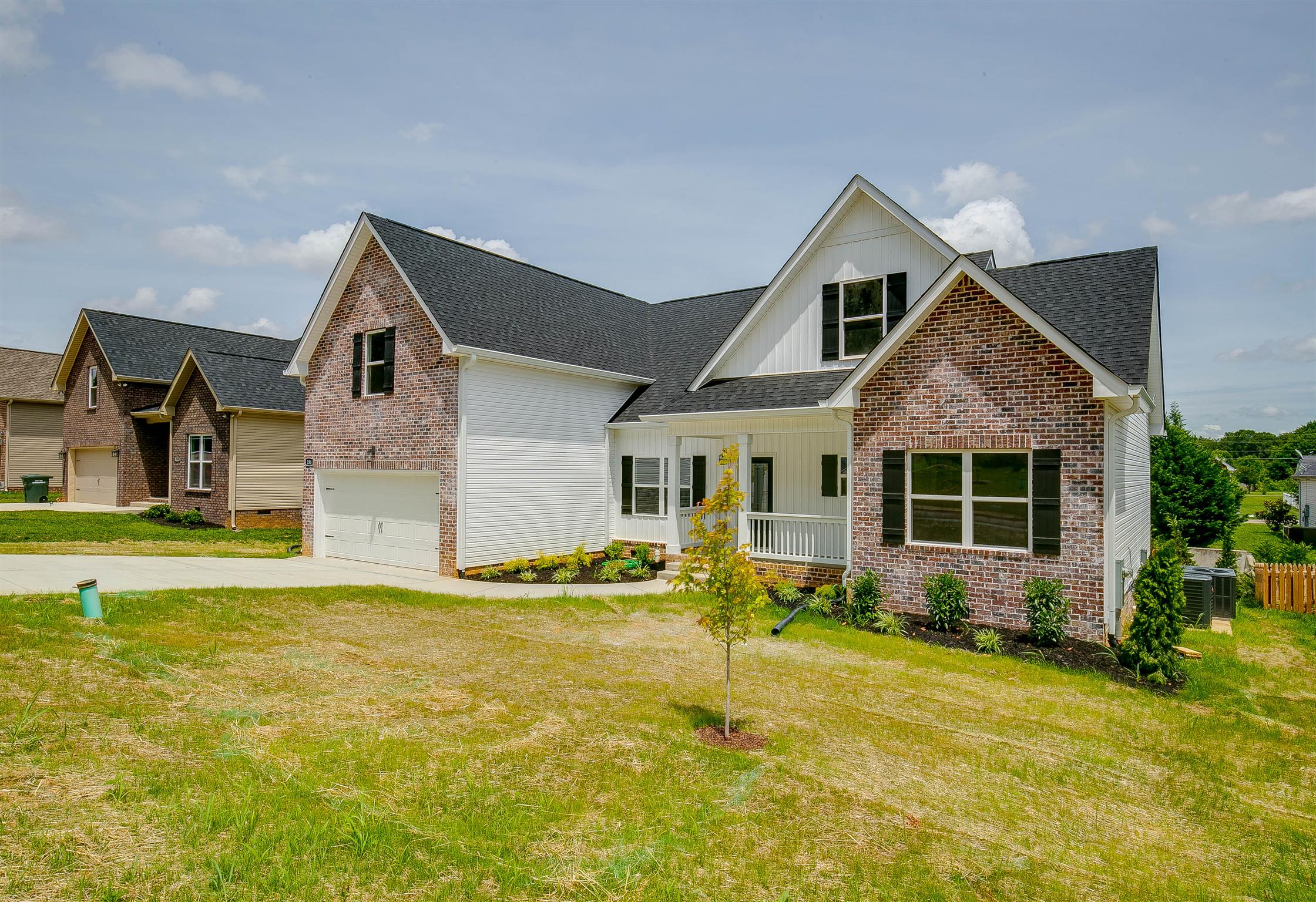 186 Fieldstone Lane Springfield, TN 37172 - Photo 3 of 22 a front view of house with yard and swimming pool