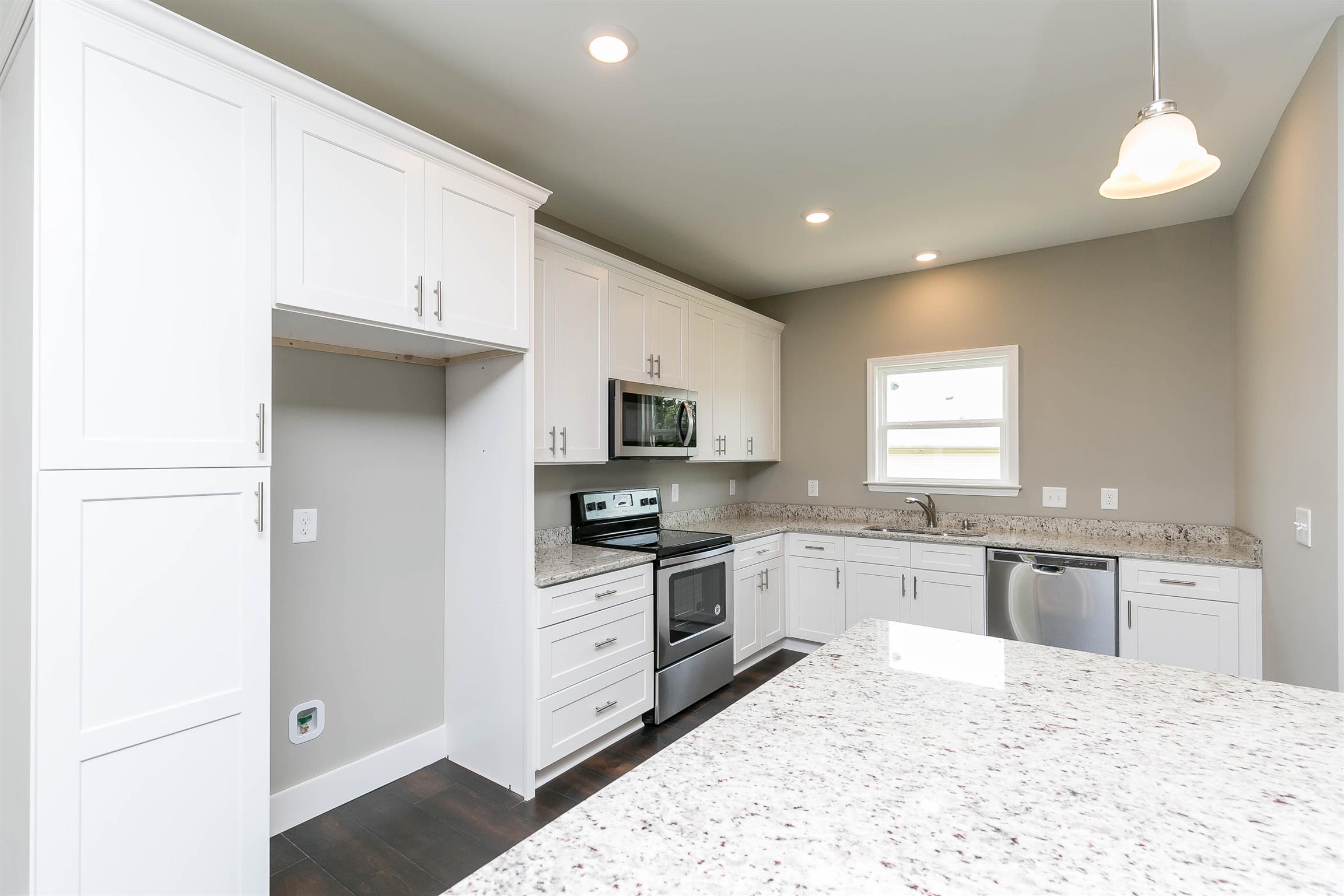 186 Fieldstone Lane Springfield, TN 37172 - Photo 8 of 22 a large kitchen with cabinets and stainless steel appliances