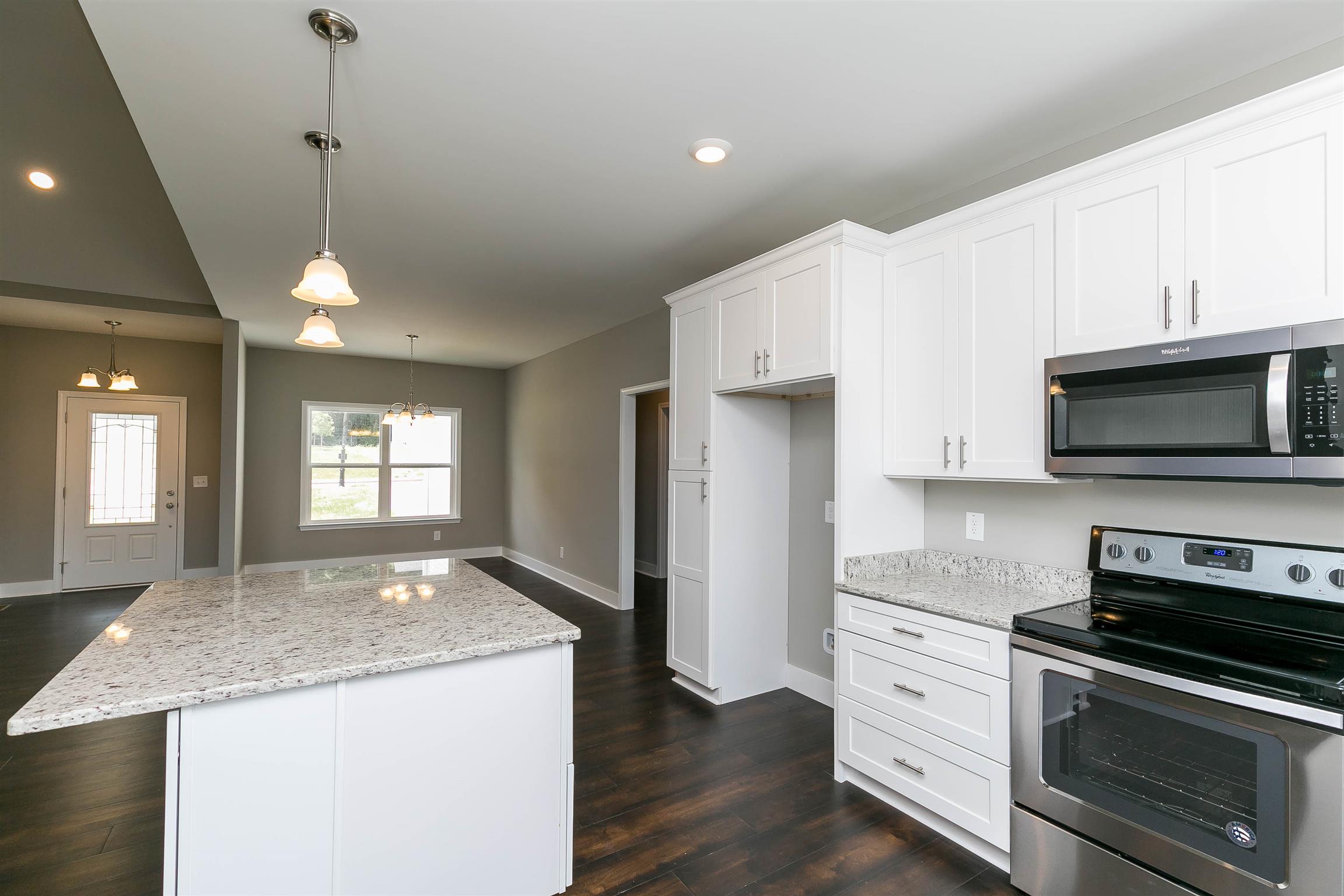 186 Fieldstone Lane Springfield, TN 37172 - Photo 9 of 22 a kitchen with a sink a microwave a stove and refrigerator