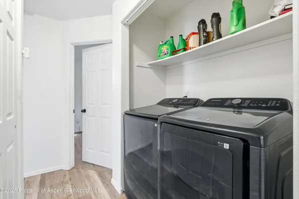a utility room with dryer and washer