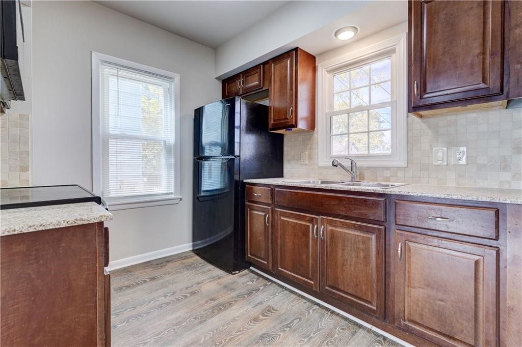 138 Steko Avenue Rochester, NY 14615 - Photo 3 of 14 Kitchen With New Granite Counter Top