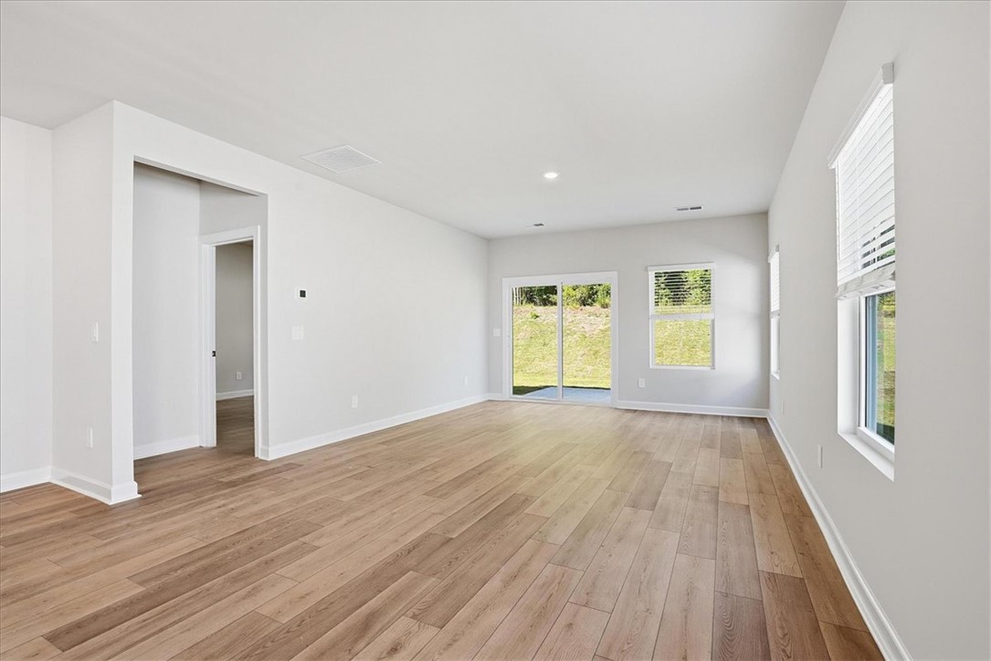 973 Penfold Pointe Point Blythewood, SC 29016 - Photo 14 of 39 This living space offers a seamless connection to the outdoors with a large sliding glass door and ample natural light.