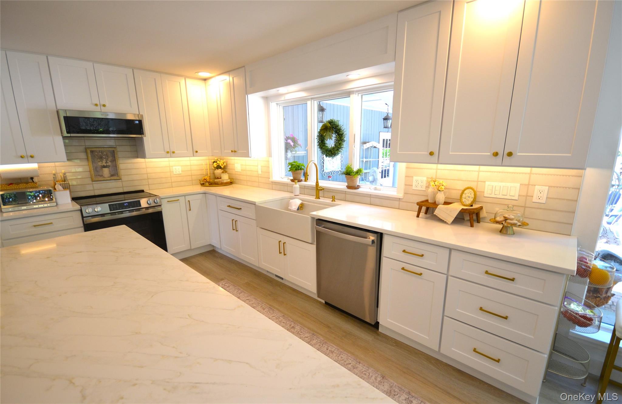 266 Shear Hill Road Mahopac, NY 10541 - Photo 4 of 34 a kitchen with cabinets oven and a dishwasher