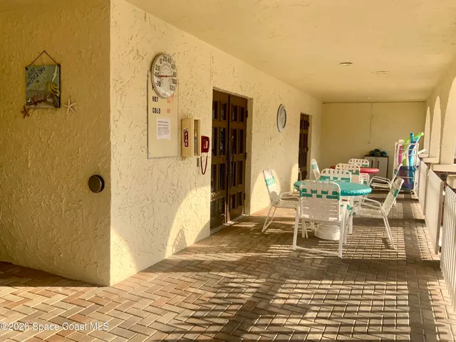 a view of a garden with houses