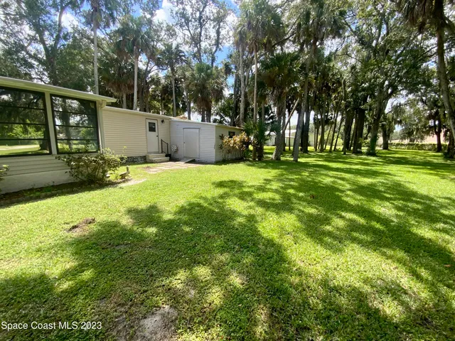 a fire hydrant in the middle of a field