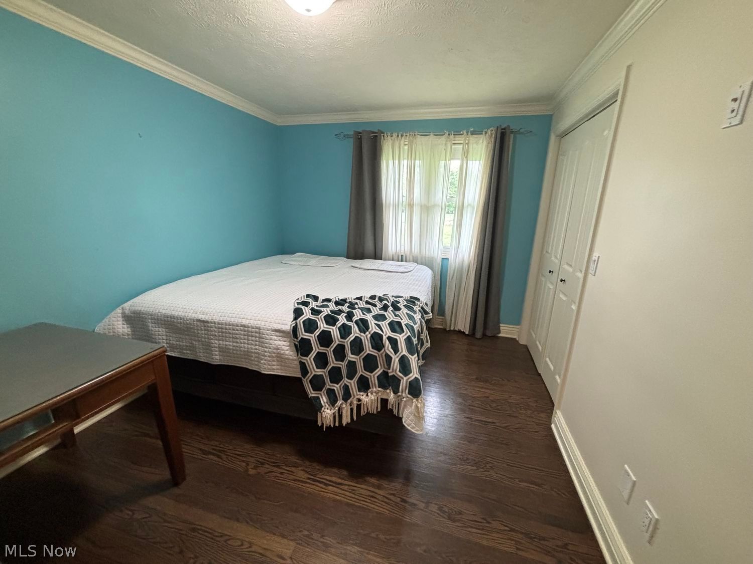 11861 Summers Road Chesterland, OH 44026 - Photo 13 of 30 Spacious bedroom with hardwood floors and crown molding