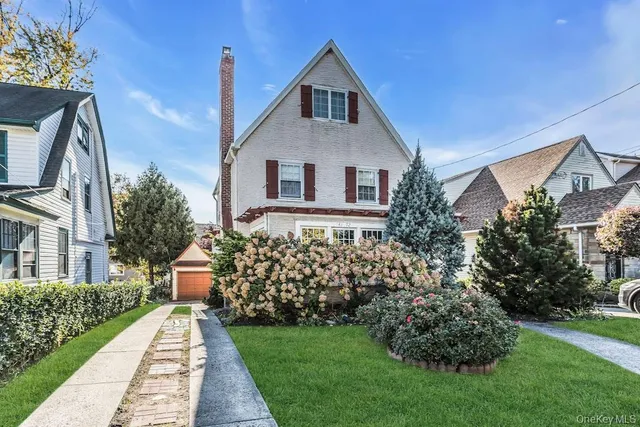 a house view with a garden space