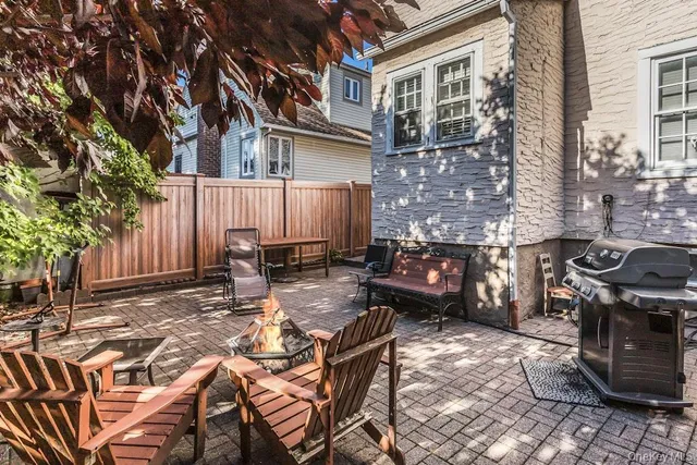 a view of a small house with a outdoor space