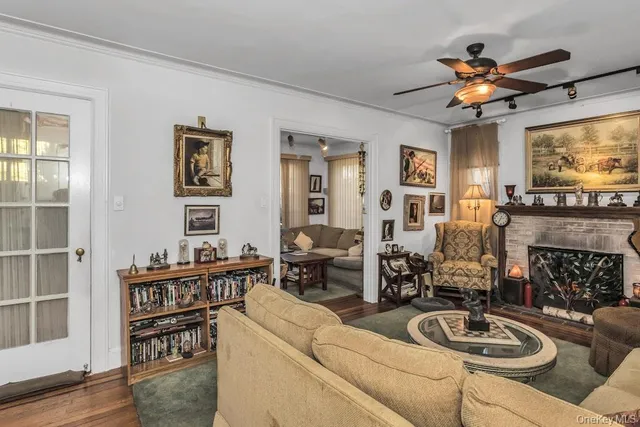 a dining room with furniture and chandelier